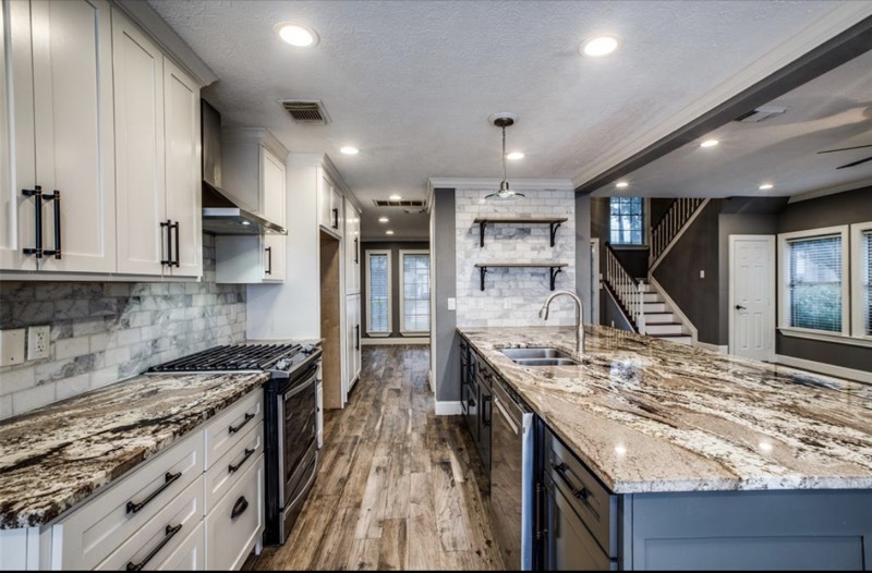 Kitchen remodel with granite countertops and marble subway backsplash in Houston